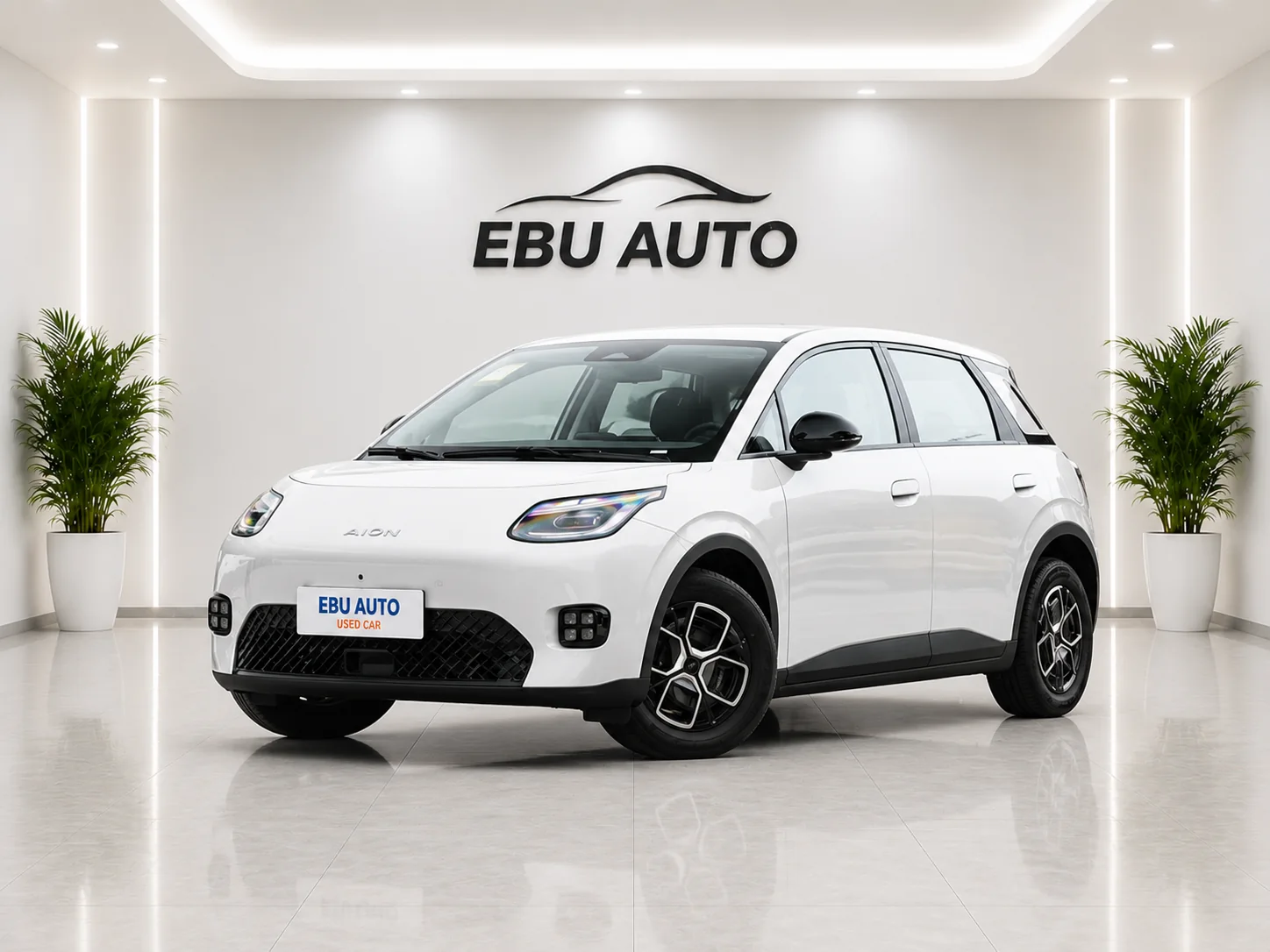 2025-2026 AION UT EV small electric hatchback front three-quarter view in EBU AUTO showroom