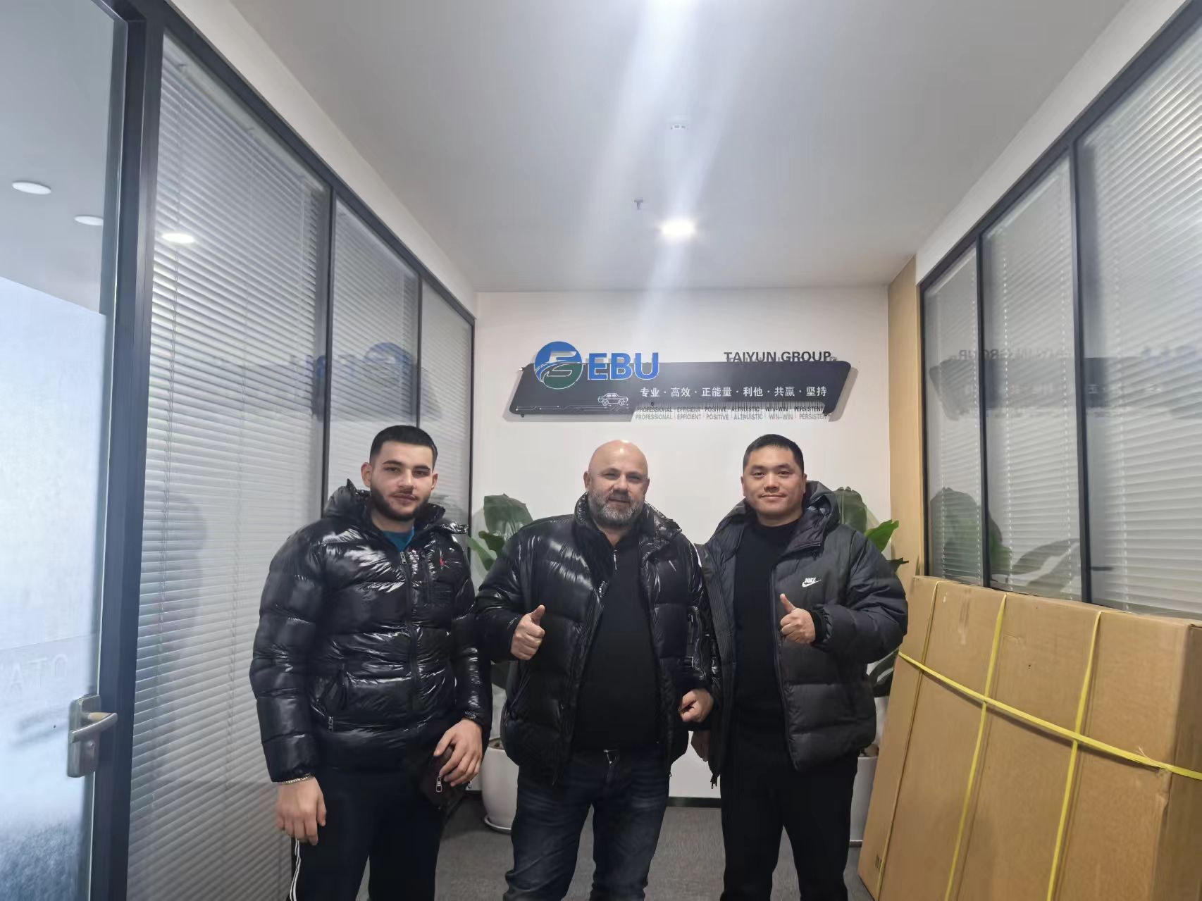 International buyer visiting a China car export office